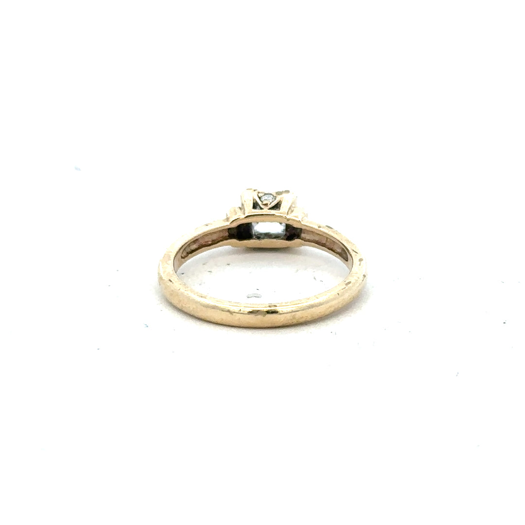 9ct yellow gold ring in size O with a simple band design, unbranded jewelry piece.