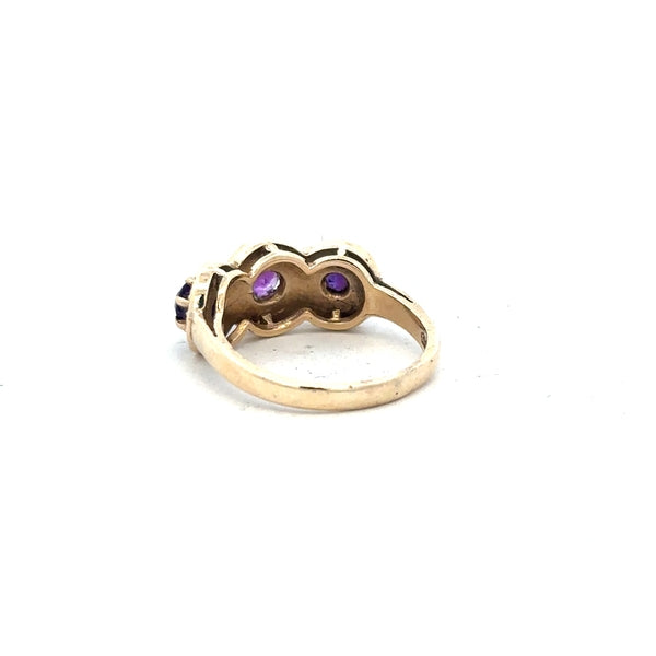 9ct yellow gold ring in size O with a smooth band, unbranded jewelry piece displayed on a neutral background.