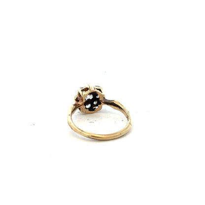 9ct yellow gold ring in size O with a smooth polished finish, unbranded jewelry displayed against a neutral background.