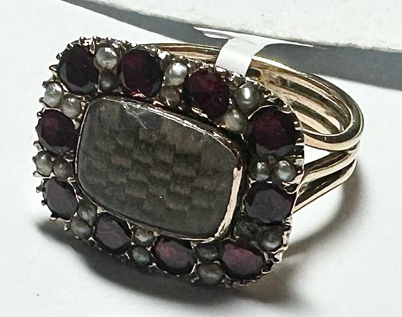 9ct yellow gold ring size O1/2 with a polished finish, unbranded, shown from a side view highlighting its smooth band.
