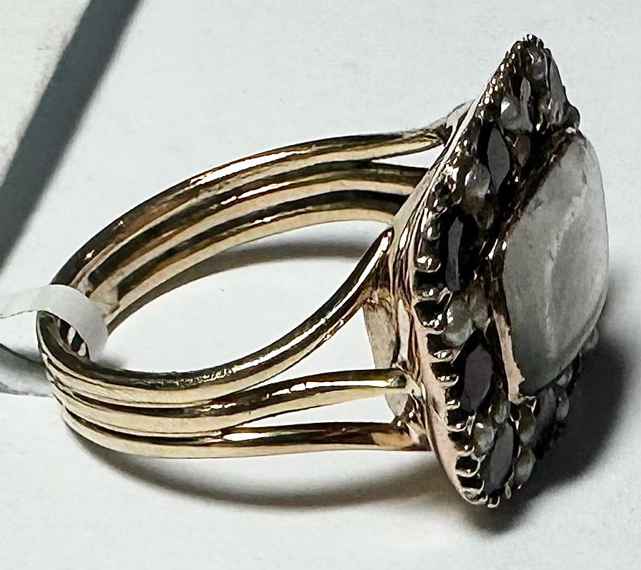 9ct yellow gold ring size O1/2, unbranded, with a smooth polished band, shown in a close-up image.