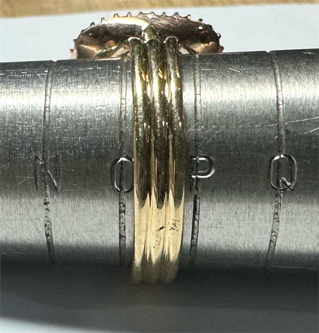 9ct yellow gold ring size O1/2, unbranded, showcasing a smooth band with a polished finish.
