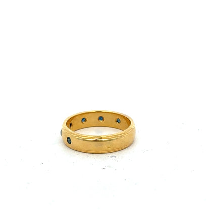 9ct yellow gold ring size O1/2 with a simple polished band, unbranded jewelry displayed against a neutral background.