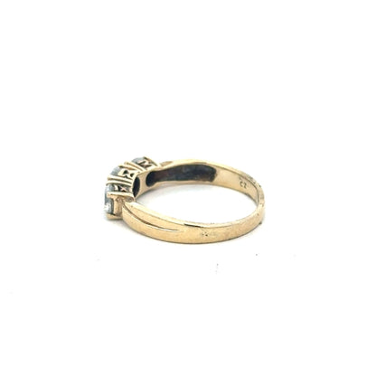 9ct yellow gold ring in size O1/2 with a simple band design, unbranded jewelry displayed on a plain background.