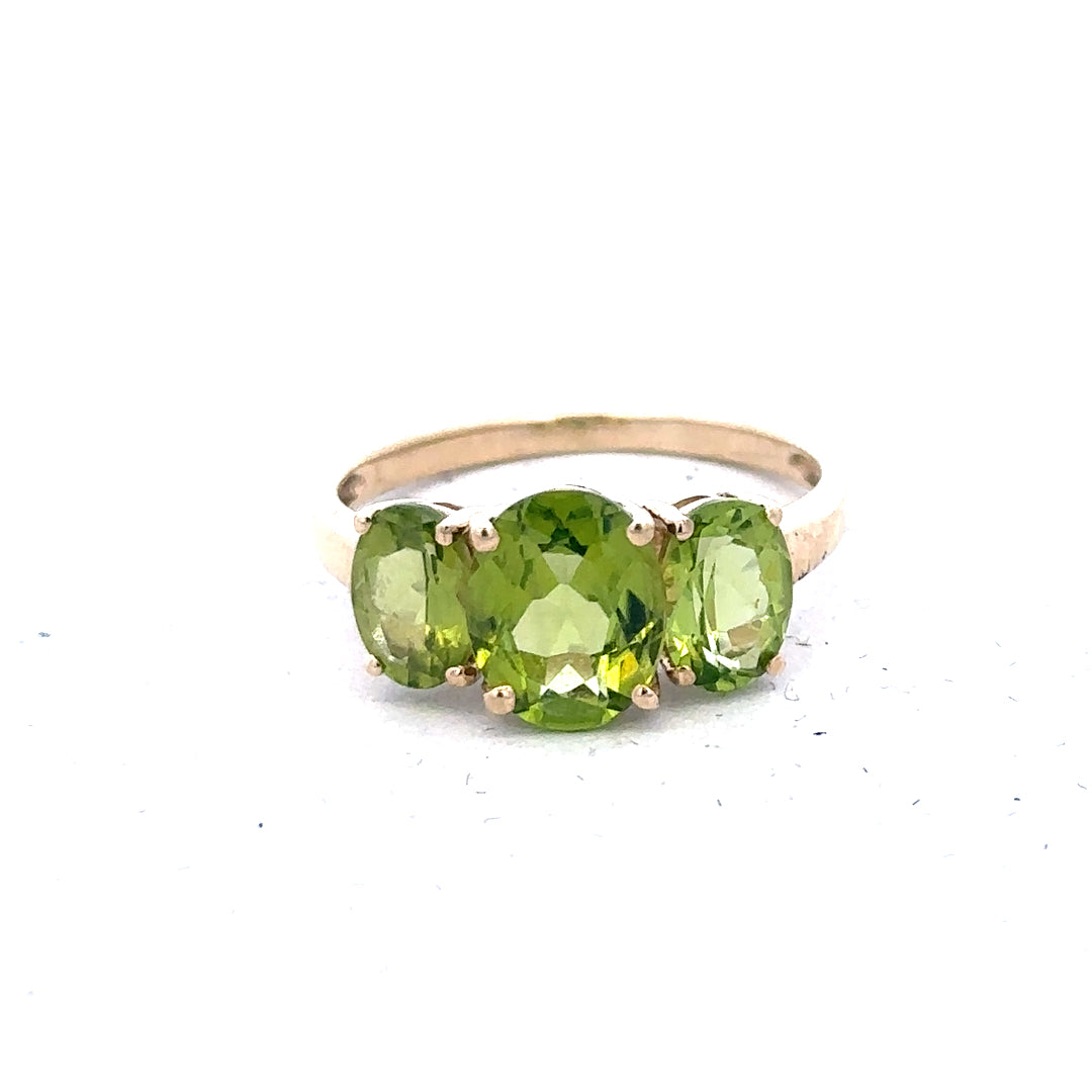 9ct yellow gold ring in size P with a smooth polished band, unbranded jewelry displayed against a neutral background.