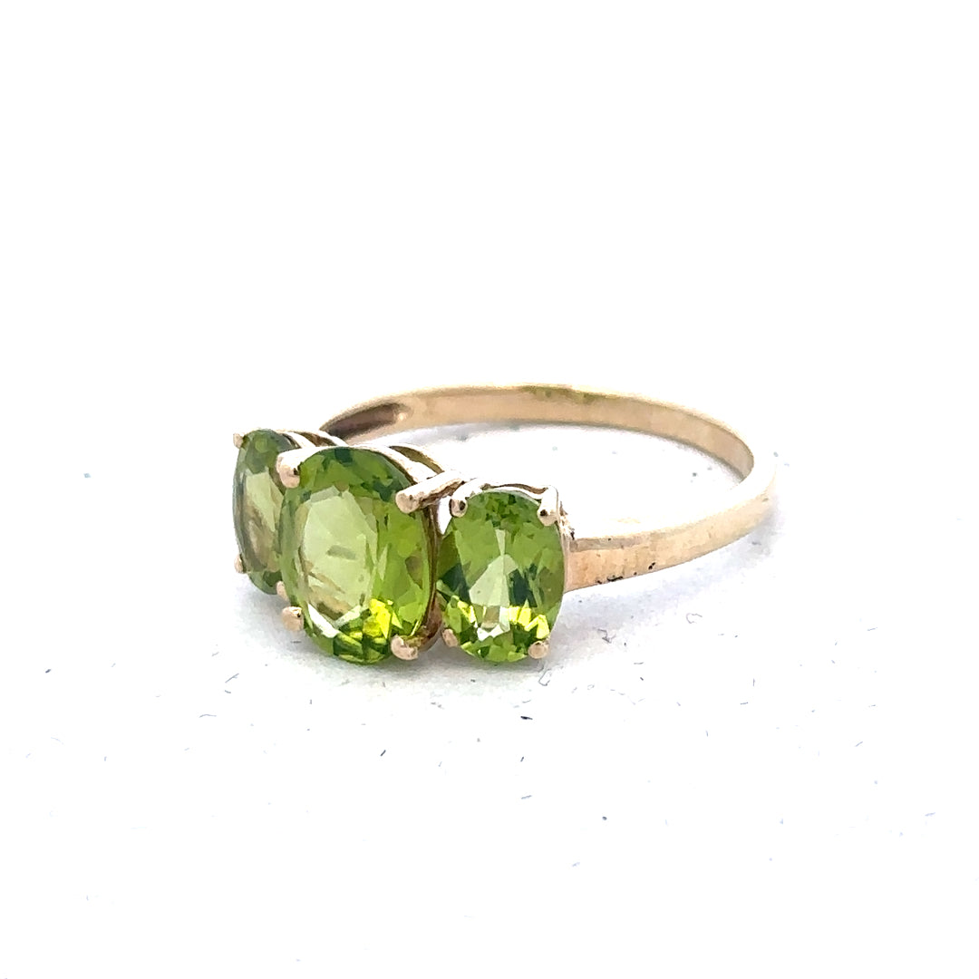 9ct yellow gold ring size P with a smooth band, unbranded jewelry piece displayed against a neutral background.