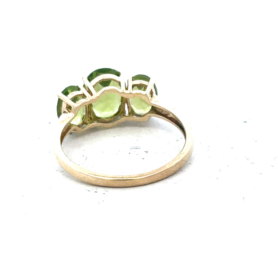 9ct yellow gold ring in size P with a simple band design, unbranded jewelry piece displayed against a plain background.