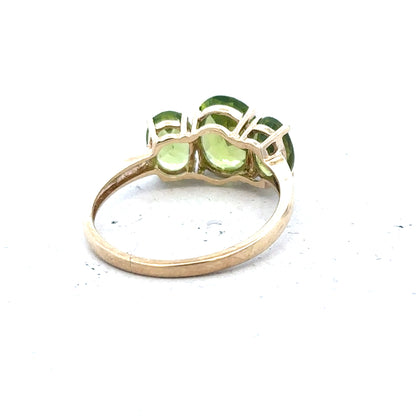 9ct yellow gold ring size P with a smooth polished band, unbranded jewelry piece displayed on a neutral background.