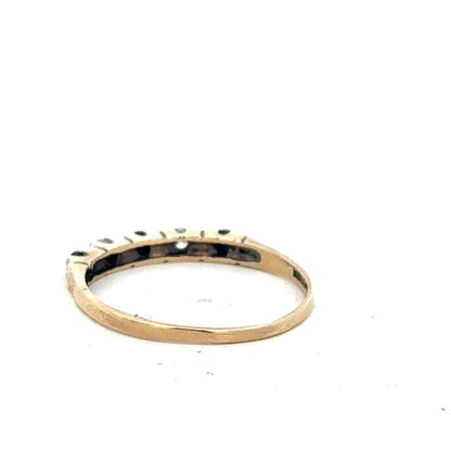 9ct yellow gold ring in size P with a smooth band, unbranded jewelry displayed against a neutral background.