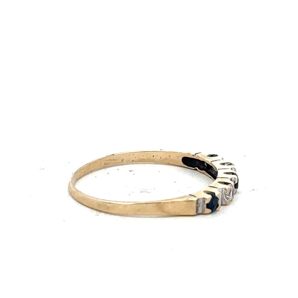 9ct yellow gold ring in size P with a simple band design, unbranded jewelry displayed on a plain background.