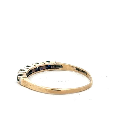 9ct yellow gold ring in size P with a simple band design, unbranded jewelry item.