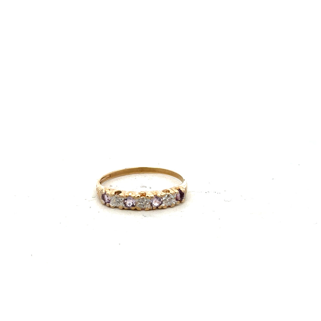 9ct yellow gold ring in size P with a simple band design, unbranded jewelry piece.