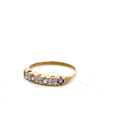 9ct yellow gold ring in size P with a smooth band, unbranded jewelry displayed on a plain background.
