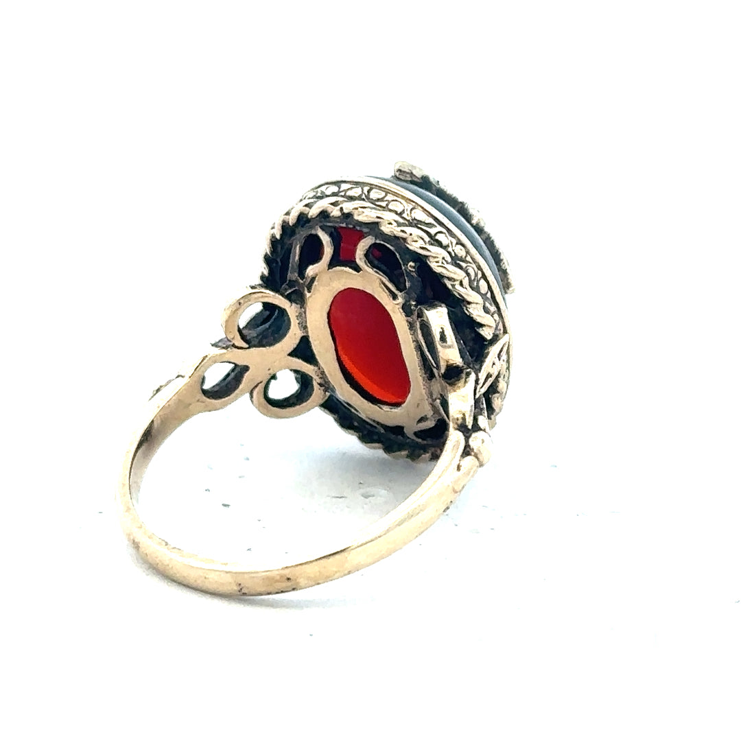 9ct yellow gold ring in size P with a smooth, polished finish, unbranded jewelry displayed on a plain background.