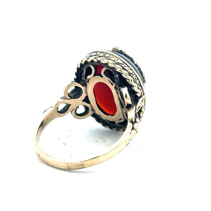 9ct yellow gold ring in size P with a smooth, polished finish, unbranded jewelry displayed on a plain background.