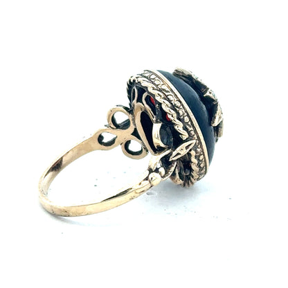 9ct yellow gold ring in size P with a smooth band, unbranded jewelry, shown close-up on a plain background.