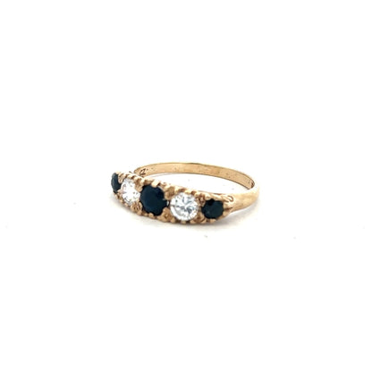 9ct yellow gold ring in size P with a simple polished band, unbranded, displayed on a white background.