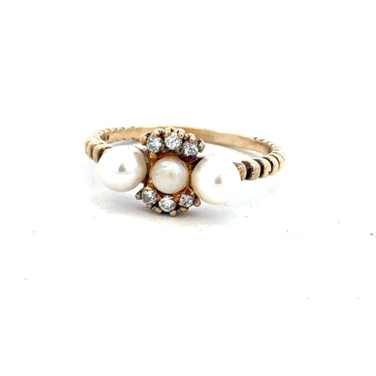9ct yellow gold ring size P with a smooth band, unbranded jewelry piece, showcased on a plain background.