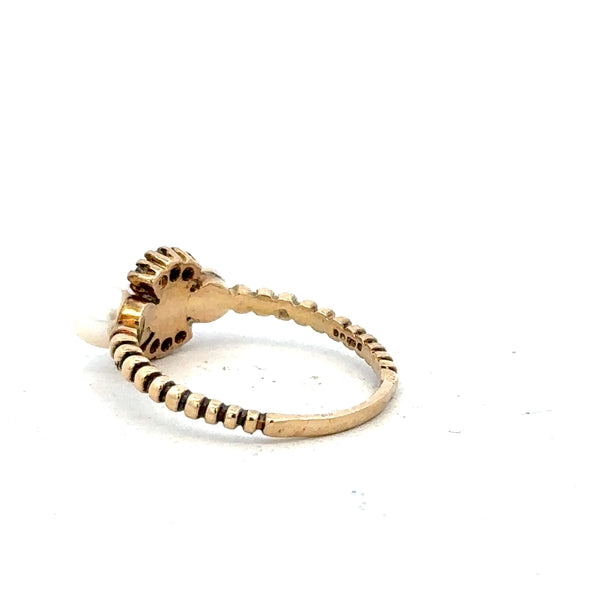 9ct yellow gold ring in size P with a simple band design, unbranded, shown from top angle on a plain background.