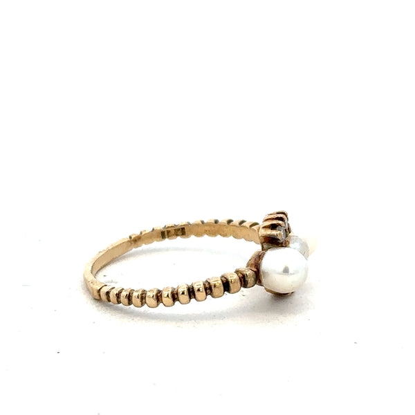 9ct yellow gold ring in size P, unbranded, with a simple band design, shown against a neutral background.