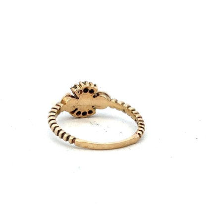 9ct yellow gold ring in size P with a simple band design, unbranded, shown in a close-up image.