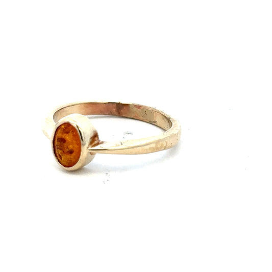 9ct yellow gold ring in size P with a smooth band, unbranded jewelry piece, showcasing a polished finish and elegant design.