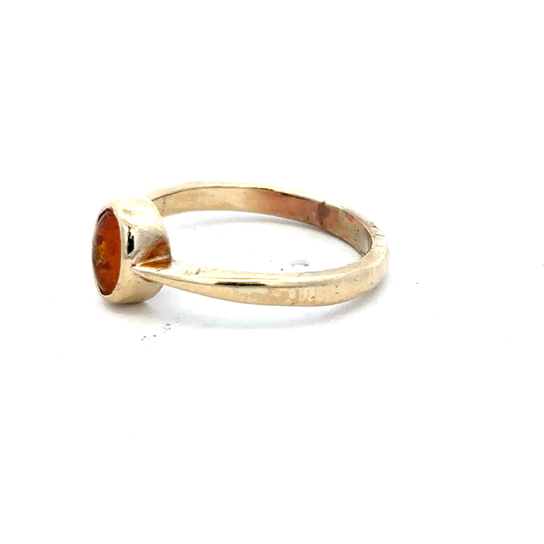 9ct yellow gold ring in size P with a smooth band, unbranded jewelry showcasing classic gold craftsmanship.