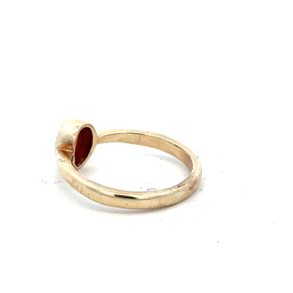 9ct yellow gold ring in size P with a smooth polished band, unbranded jewelry piece on a neutral background.