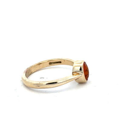 9ct yellow gold ring in size P, featuring a smooth polished band, unbranded jewelry, close-up view.