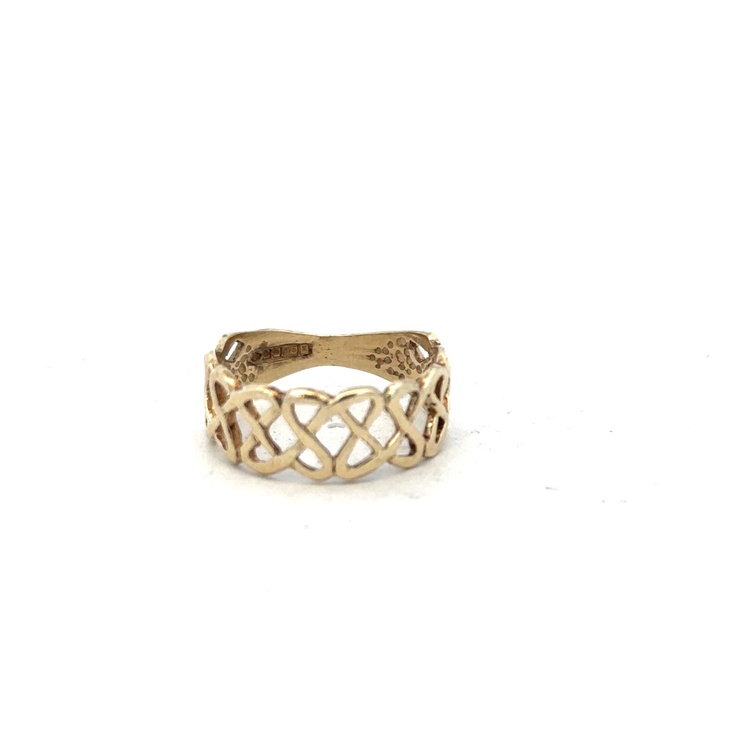 9ct yellow gold ring in size P with a smooth band, unbranded jewelry piece displayed against a neutral background.