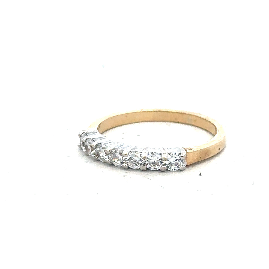 9ct yellow gold ring size P, unbranded jewelry with a smooth band, displayed on a neutral background.