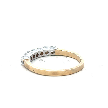 9ct yellow gold ring in size P with a smooth polished finish, unbranded jewelry displayed against a plain background.