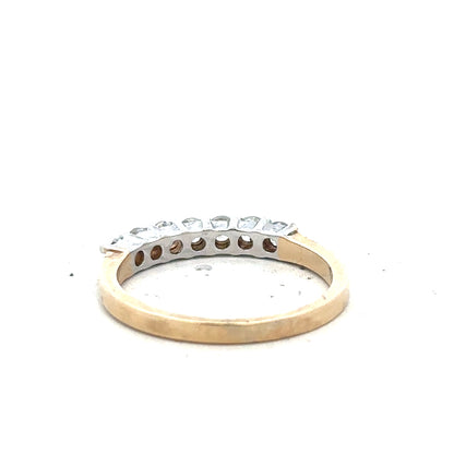 9ct yellow gold ring in size P with a smooth band, unbranded, showcasing a simple elegant design.