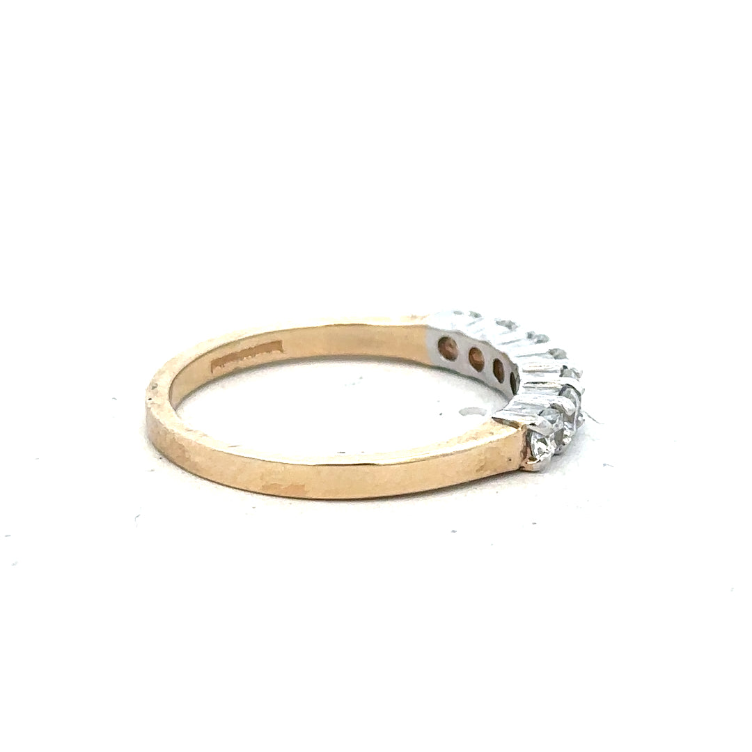 9ct yellow gold ring size P with a smooth band, showcasing a polished finish and classic design.