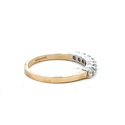 9ct yellow gold ring size P with a smooth band, showcasing a polished finish and classic design.