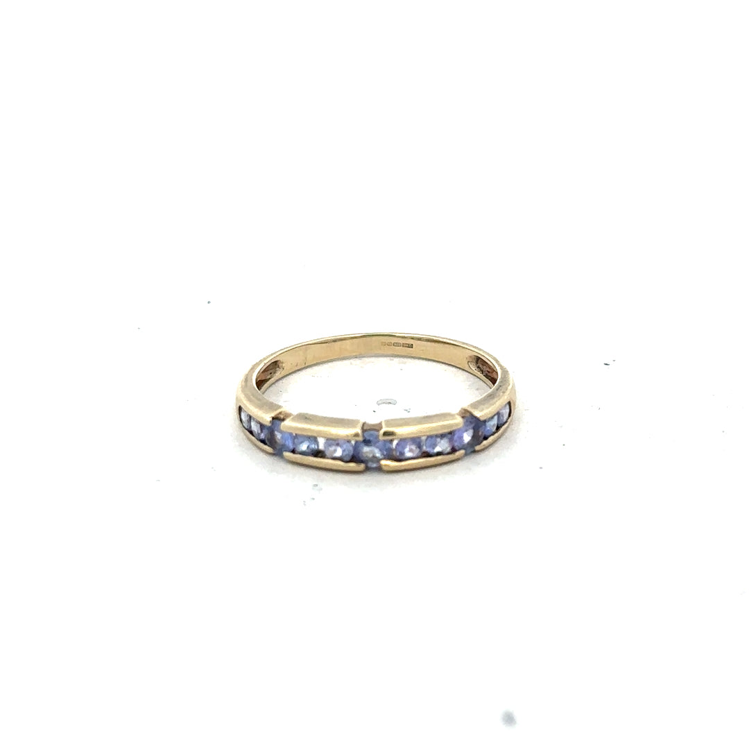 9ct yellow gold ring in size P with a smooth polished finish, unbranded jewelry displayed on a white background.