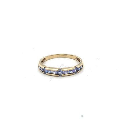 9ct yellow gold ring in size P with a smooth polished finish, unbranded jewelry displayed on a white background.