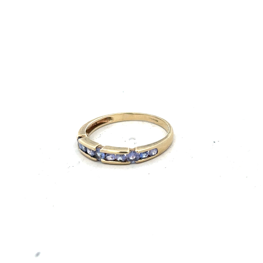 9ct yellow gold ring in size P with a smooth band, unbranded jewelry showcasing classic gold craftsmanship.