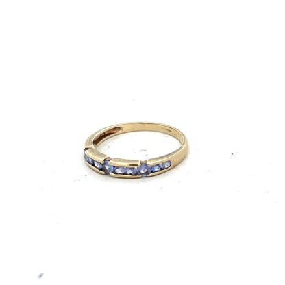 9ct yellow gold ring in size P with a smooth band, unbranded jewelry showcasing classic gold craftsmanship.