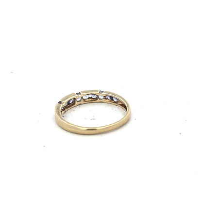 9ct yellow gold ring size P with a smooth polished band, unbranded jewelry piece, detailed close-up.