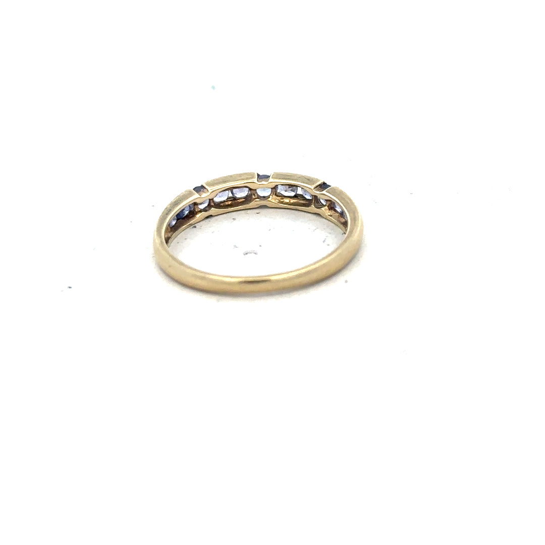 9ct yellow gold ring in size P with a smooth band, unbranded jewelry showcasing classic gold craftsmanship.
