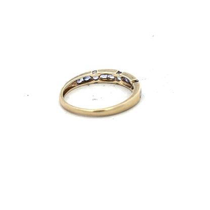 9ct yellow gold ring in size P with a smooth band, unbranded jewelry piece showcasing classic gold craftsmanship.