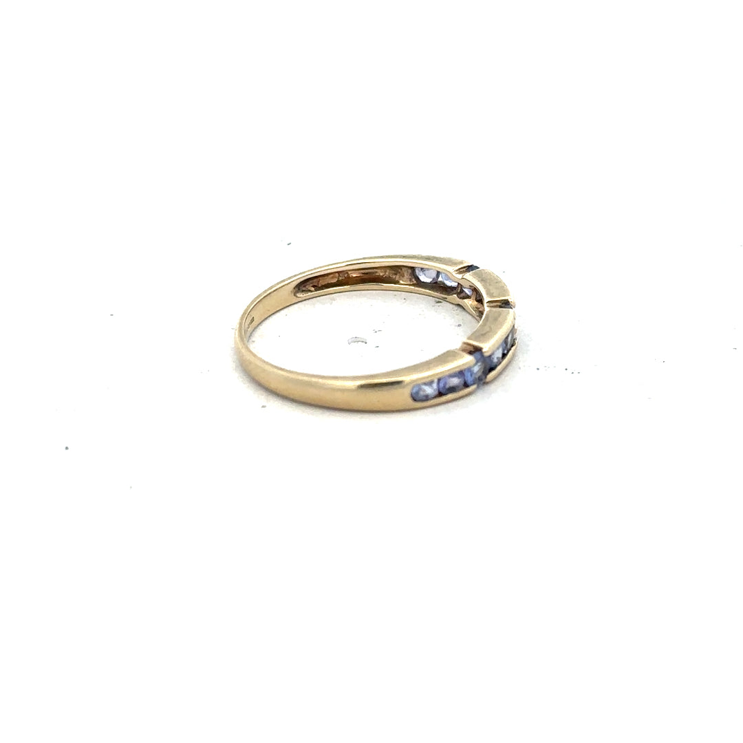 9ct yellow gold ring size P with a smooth polished band, unbranded jewelry accessory, shown close-up.
