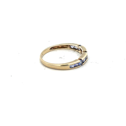 9ct yellow gold ring size P with a smooth polished band, unbranded jewelry accessory, shown close-up.