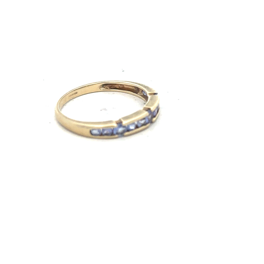 9ct yellow gold ring in size P with a smooth band, unbranded jewelry piece, shown against a plain background.