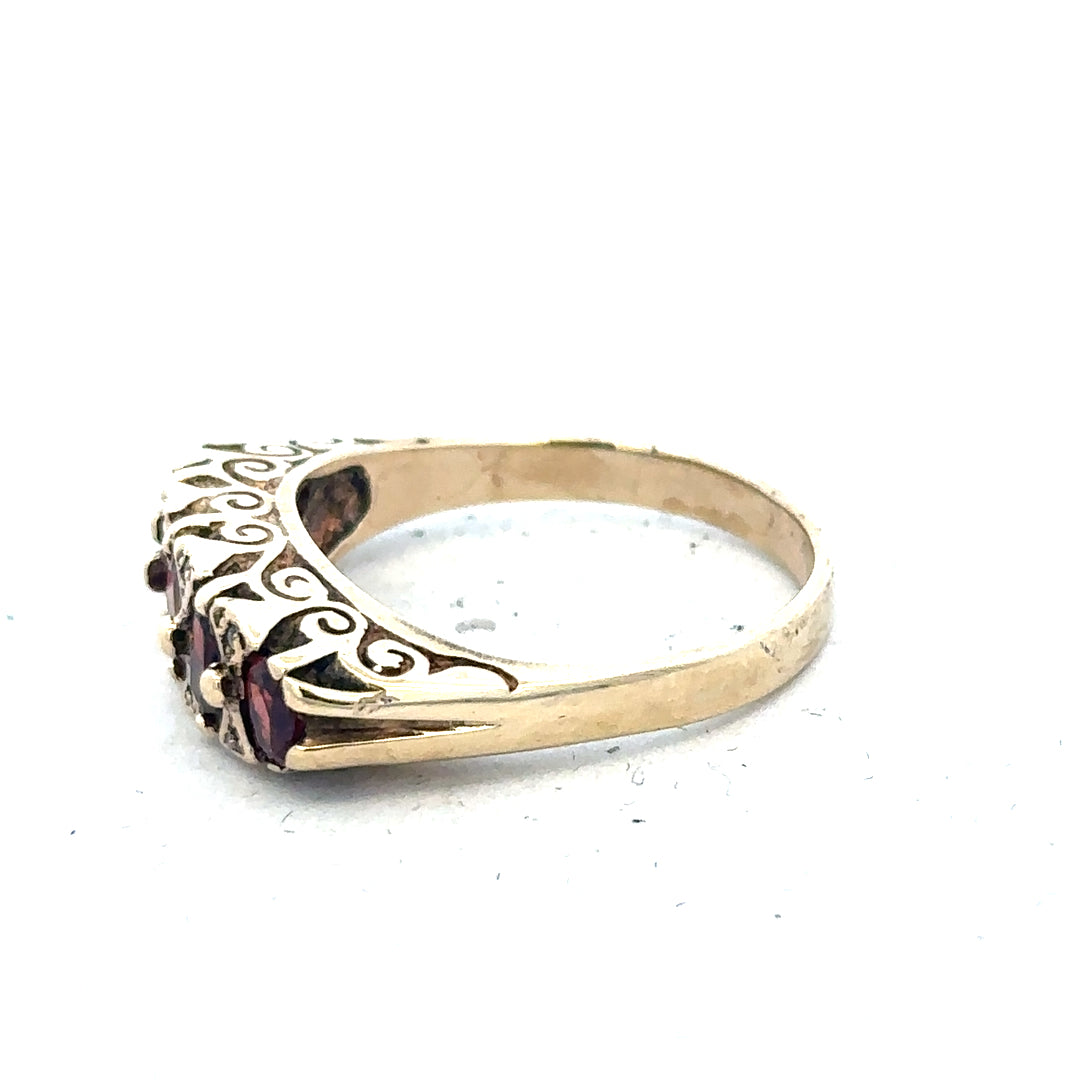 9ct yellow gold ring in size Q with a smooth band, unbranded, showcasing a polished finish and classic design.