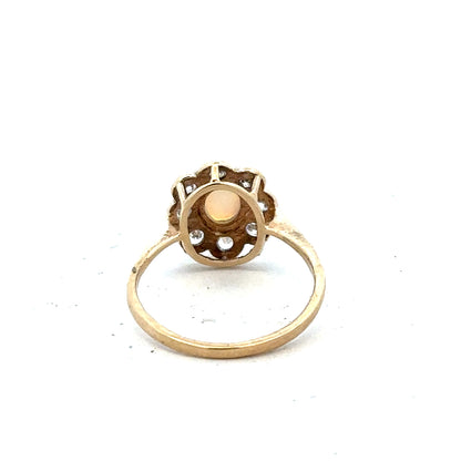 9ct yellow gold ring in size Q with a smooth band, unbranded, shown on a plain background.