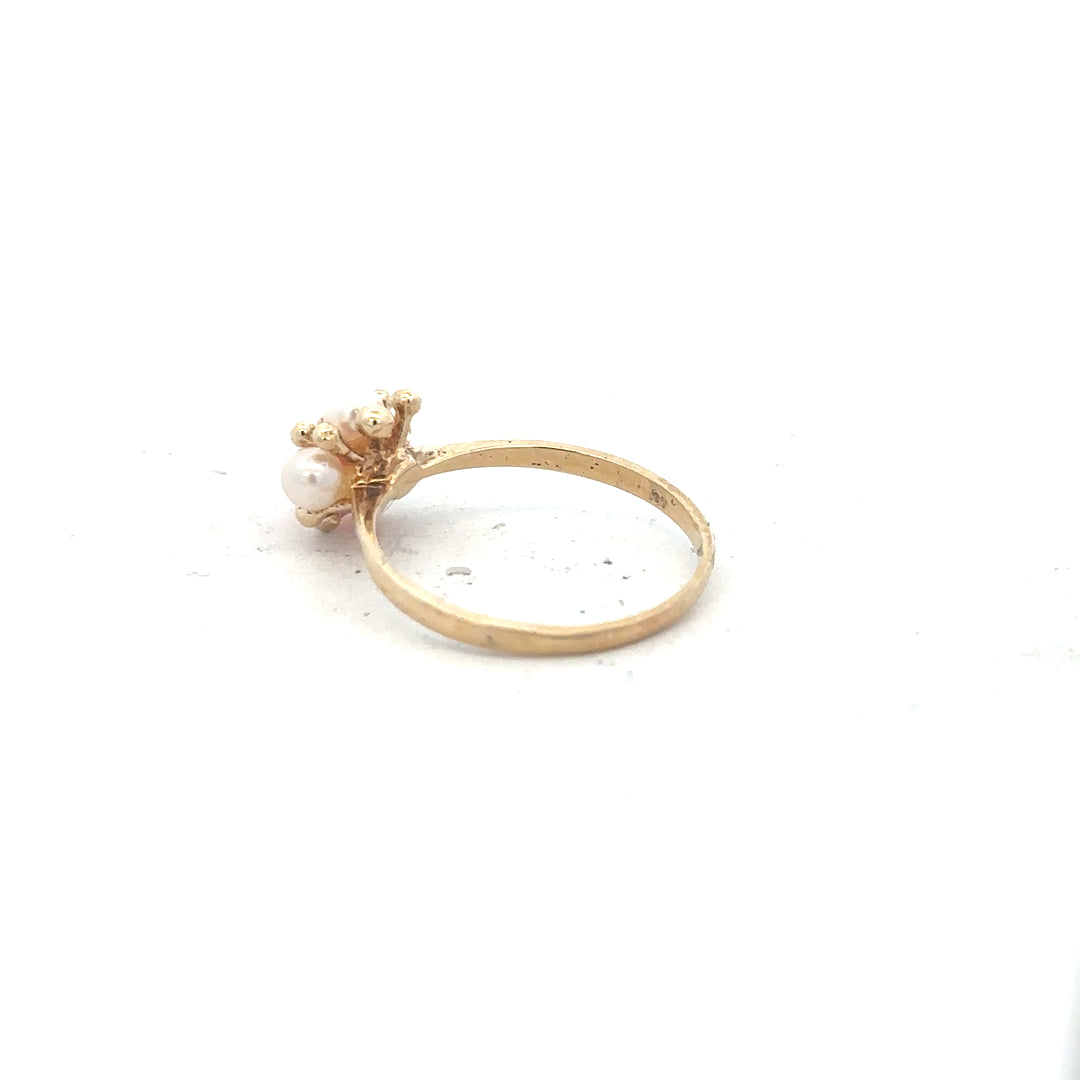 9ct yellow gold ring in size Q with a smooth band, unbranded, showcasing its shiny, polished finish and classic design.