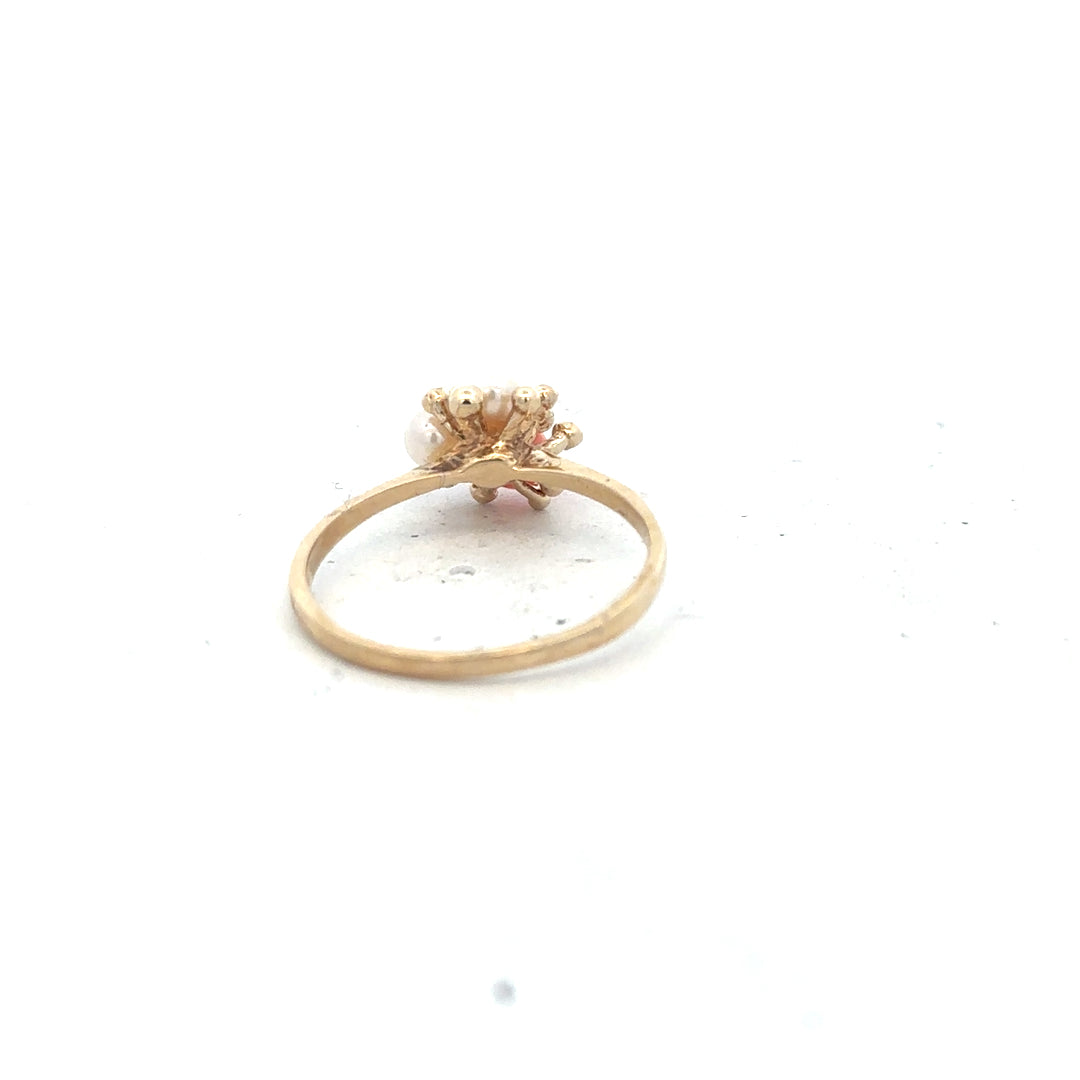9ct yellow gold ring in size Q with smooth band, unbranded jewelry showing detailed craftsmanship.