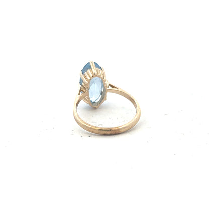 9ct yellow gold ring in size Q with a smooth band, unbranded, showing a close-up view of the jewelry.
